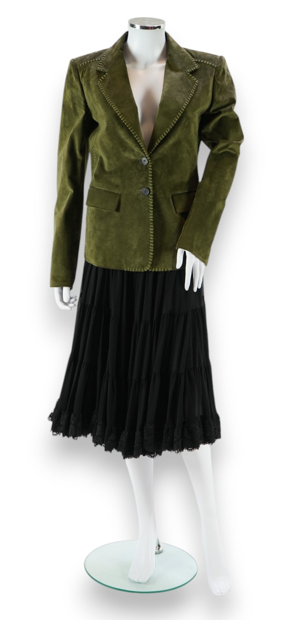 A lady's Yves Saint Laurent olive green suede jacket with stitching details and a black YSL (label missing) gypsy skirt with underskirt. IT 38 (UK size 10)